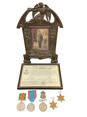 Lot 769 - Second World War medals comprising 1939 - 1945 Star, France and Germany Star, Defence and War medals, together with a French Commemorative medal, silver A.R.P. badge, and a framed photograph of...