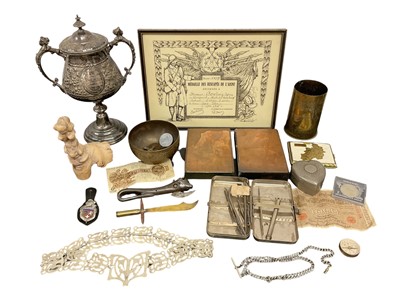 Lot 770 - Group of Militaria to include a First World War brass Trench Art vase with Egyptian style decoration dated 1916, together with a trophy cup with engraved Essex Regiment presentation inscription...