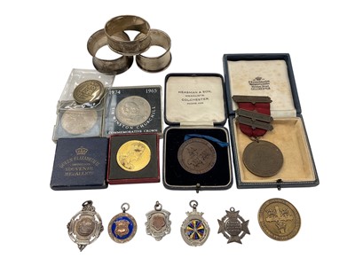 Lot 976 - Three silver napkin rings, silver fobs, Colchester Royal Grammar School medallions, coins etc