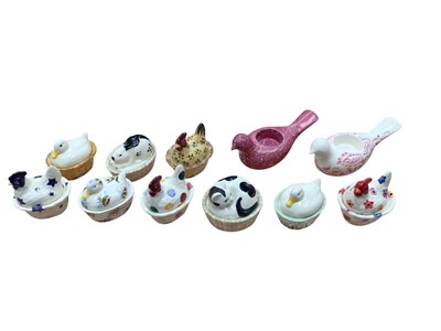Lot 1201 - Collection of Emma Bridgewater coddlers including hen on nest, duck on nest with bee decoration etc, together with two bird candleholders (11)