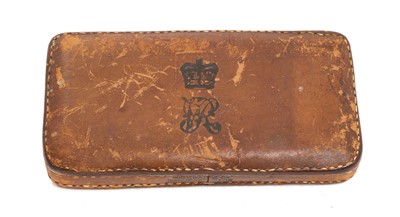 Lot 54 - Victorian Royal Household / Civil service leather-covered paperweight with crowned VR cypher