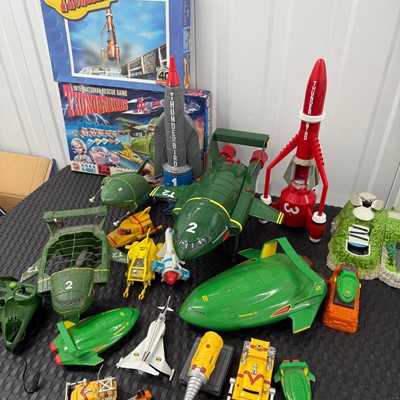 Lot 2092 - Thunderbirds, Captain Scarlett and other Gerry Anderson vehicles & playsets, plus an International Rescue game and Thunderbirds jigsaw puzzle (qty)