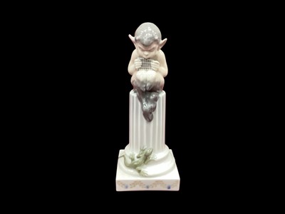 Lot 1211 - Royal Copenhagen porcelain figure - Fawn with lizard, model no. 433