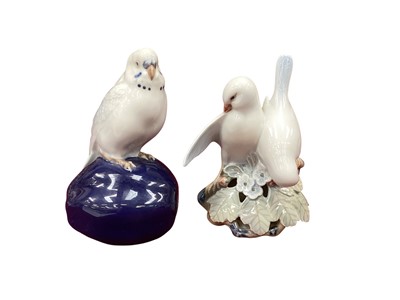 Lot 1217 - Royal Copenhagen porcelain figure - Budgerigar model no. 4682, together with a pair of lovebirds model no. 056 (2)