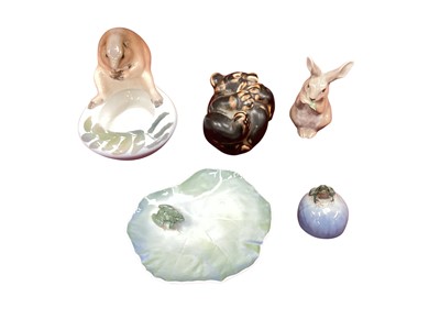Lot 1219 - Five pieces of Royal Copenhagen - Beaver on bowl no. 615, Frog on lily pad 2477, Frog on rock 061, Rabbit 080 and Bear biting it's foot