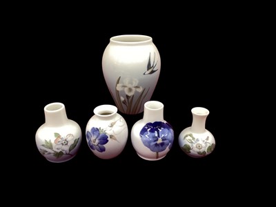 Lot 1222 - Four Royal Copenhagen vases with floral decoration, together with a larger vase decorated with bird and flower (5)