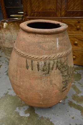 Lot 1240 - Antique terracotta olive oil jar of prodigious size