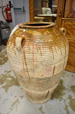 Lot 1241 - Antique terracotta olive oil jar of prodigious size