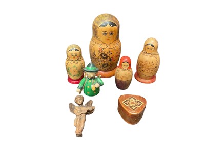 Lot 2448 - Two boxes of treen, including bread boards, Russian dolls, etc