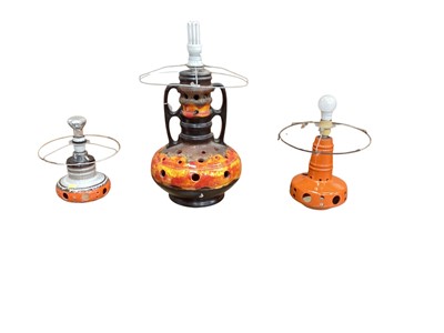Lot 1230 - Three West German Lava pottery lamps