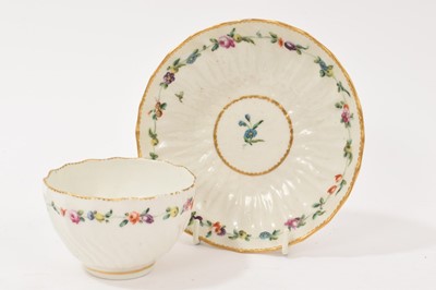 Lot 100 - Chelsea Derby spirally fluted tea bowl and saucer, circa 1770, marks in gilt