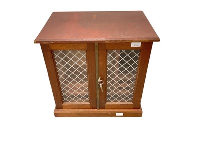 Lot 539 - Coin Accessories - A large windowed coin collectors wood cabinet with trays, drawers & key (1 item)