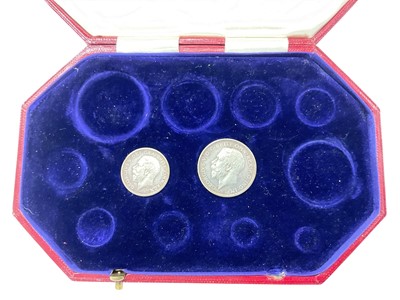 Lot 541 - G.B. - 1911 specimen coin case containing two specimen silver coins, Shilling & Florin (2 coins)