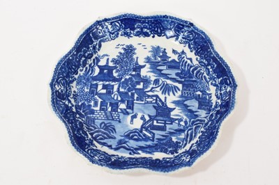 Lot 94 - Worcester blue and white Temple pattern teapot stand, circa 1775, disguised numeral mark