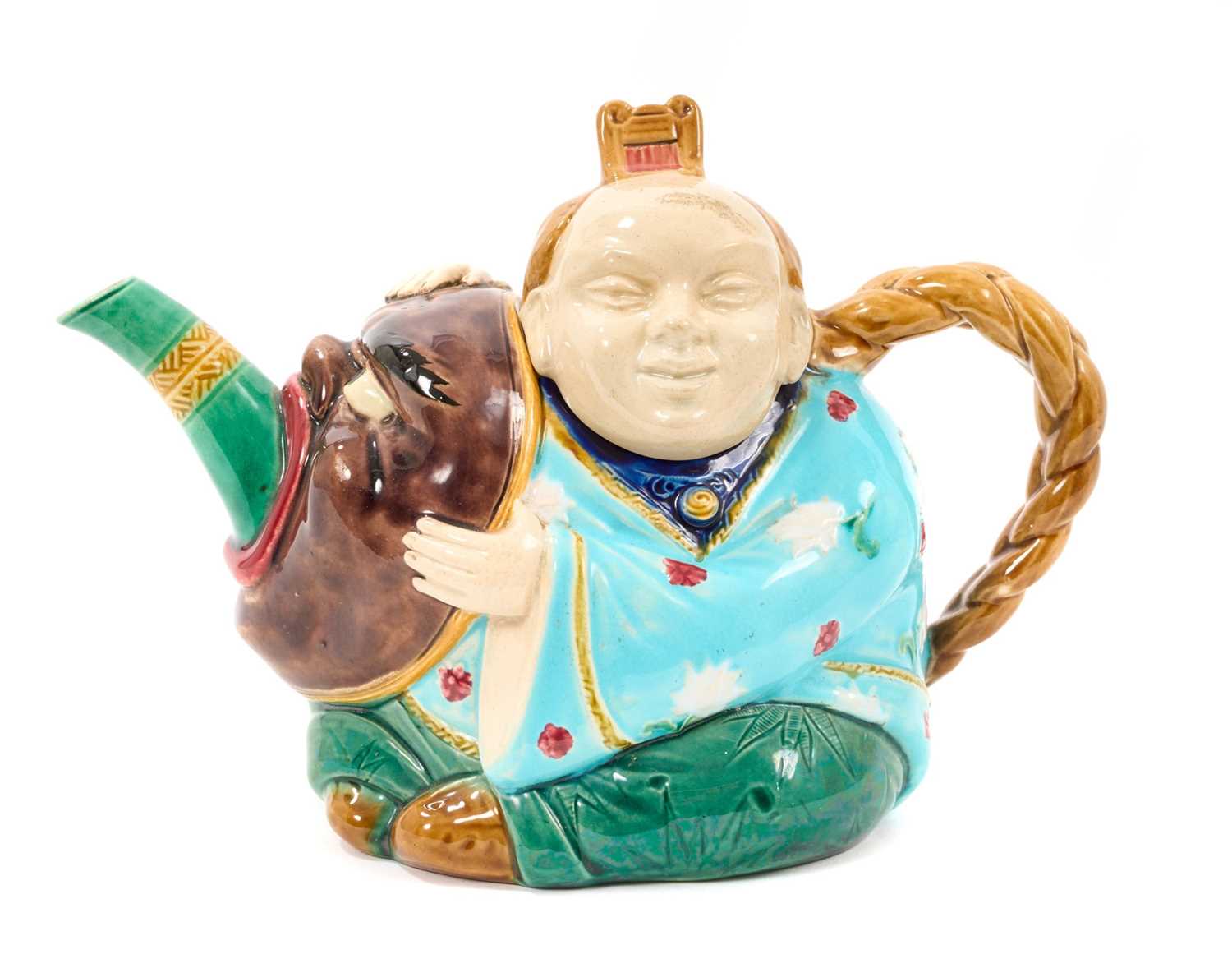 Lot 56 - Minton majolica teapot and cover, in the form of a seated Chinaman, circa 1880