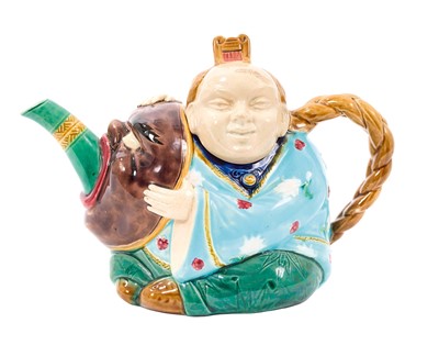 Lot 72 - Minton majolica teapot and cover, in the form of a seated Chinaman, circa 1880