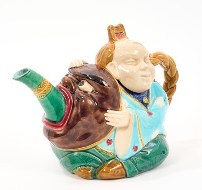 Lot 56 - Minton majolica teapot and cover, in the form of a seated Chinaman, circa 1880