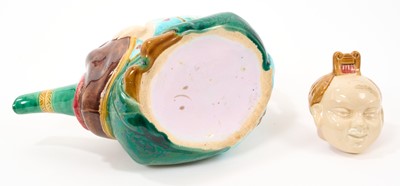 Lot 56 - Minton majolica teapot and cover, in the form of a seated Chinaman, circa 1880