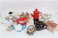 Lot 2176 - Collection of novelty teapots - including...