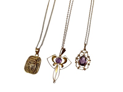 Lot 109 - Edwardian 9ct gold amethyst open work pendant on chain, one other 9ct gold amethyst pendant on chain and an Egyptian yellow metal pendant on 9ct gold chain