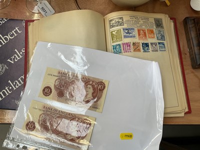 Lot 5024 - Stamp album together with two 10 shillings bank notes.