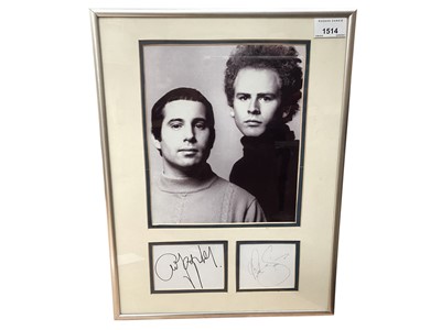 Lot 1514 - Simon and Garfunkel signatures, presented with portrait photographs in glazed frame