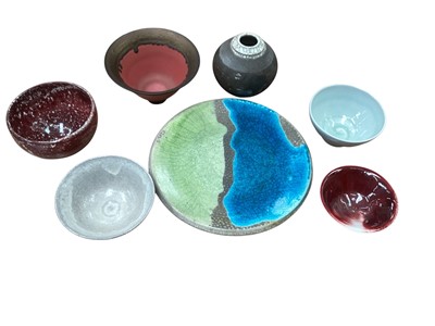 Lot 1286 - Two pieces of Raku glazed studio pottery, together with five similar bowls, most signed (7)