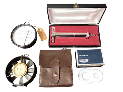 Lot 2534 - 20th century lacquered brass wind gauge by Short & Mason in leather case, together with a Negretti & Zambra humidity gauge and other items, (1 box).