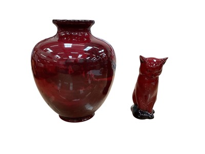 Lot 1291 - Royal Doulton Flambé vase with landscape decoration, 19cm high, together with a Flambé cat (2)