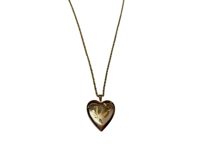 Lot 153 - 14ct gold heart shaped locket pendant on 14ct gold rope twist chain, 45.5cm long