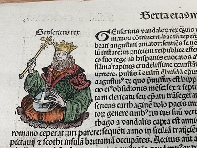 Lot 1635 - Leaf from the Nürnberg Chronicle printed by Anton Koberger in 1493 in Nuremberg, with woodcuts, hand coloured