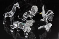 Lot 2191 - Four Swarovski crystal items - Lion, Tiger,...