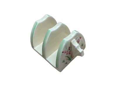 Lot 1302 - Clarice Cliff Bizarre range toast rack with hand-painted decoration, 8.5cm wide