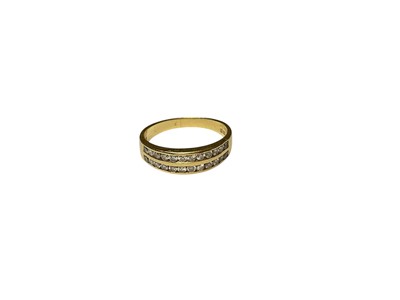 Lot 176 - 18ct gold diamond two row half eternity ring in channel setting