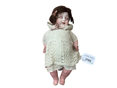 Lot 2704 - Vintage china head doll, with knitted outfit (1)