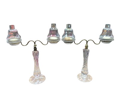 Lot 2603 - Pair late Victorian two branch glass and gilt metal mounted candelabra with spiral moulded supports, moulded tea light candle holders with 'Cricklite' glass storm shades, 45cm high, 37cm wide. So...
