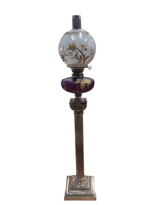 Lot 2614 - Fine Victorian oil lamp with silver plated Corinthian column support, gilt lily painted purple glass reservoir, fine gold and silver pained opaque glass shade decorated with birds 100cm high