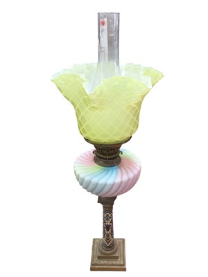 Lot 2623 - Victorian oil lamp with brass and Champleve enamel inlaid column support multicoloured satin glass reservoir and yellow diamond quilted satin glass shade with handkerchief border 65cm high