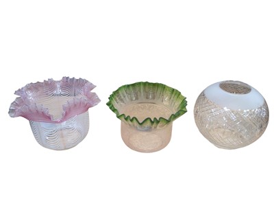 Lot 2634 - Victorian pink trailed and white glass oil lamp shade with handkerchief border, another with green tinted and etched decoration and cut glass globe shade (3)