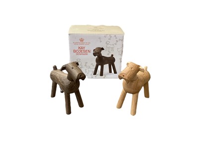 Lot 2694 - Kay Bojesen of Denmark, wooden Dog Tim figure, with original box, together with another unboxed, (2).