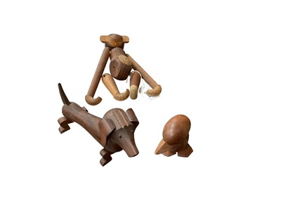 Lot 2695 - Kay Bojesen of Denmark, wooden monkey figure, together with a dog and a bird, (3).