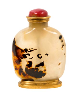Lot 675 - Fine antique Chinese shadow agate snuff bottle of large size, with coral stopper and engraved bird to underside, 10cm high