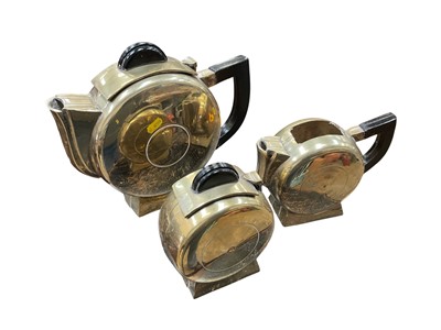 Lot 208 - Three piece Art Deco metalware tea set