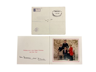 Lot 34 - T.R.H. The Prince and Princess of Wales, signed 1991 Christmas card with twin gilt Royal cyphers to cover, formal colour photograph of the Royal couple with the young Princes seated on a bench ,...
