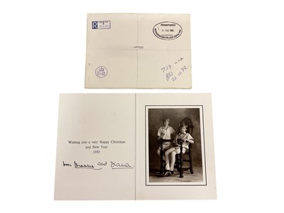 Lot 35 - T.R.H. The Prince and Princess of Wales, signed 1992 Christmas card (the last Christmas card they signed as a couple) with twin gilt Royal cyphers to cover, black and white somber photograph yo...