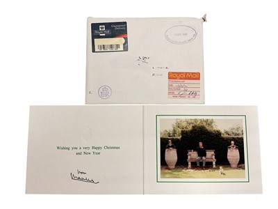 Lot 38 - H.R.H. Prince Charles Prince of Wales (now H.M. King Charles III), signed 1995 Christmas card with gilt Royal cyphers to cover, colour photograph of the relaxed Prince with his two sons in the ga...