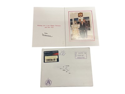 Lot 40 - H.R.H. Prince Charles Prince of Wales (now H.M. King Charles III), signed 1997 Christmas card with gilt Royal cyphers to cover, colour photograph of the relaxed Prince with his two sons on board...