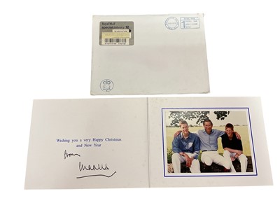 Lot 42 - H.R.H. Prince Charles Prince of Wales (now H.M. King Charles III), signed 1999 Christmas card with gilt Royal cyphers to cover, colour photograph of the relaxed Prince with his two sons seated on...