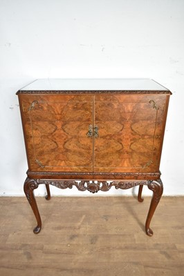 Lot 1221 - 1930s walnut cocktail cabinet