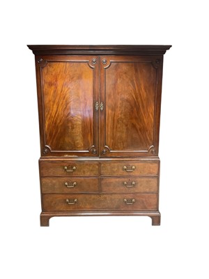 Lot 1209 - George III mahogany linen press